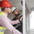 medium shot man holding drill